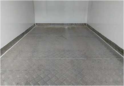 Anti-slip flooring in truck compartment